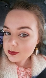 Wearing Apocalypse Lip Gloss